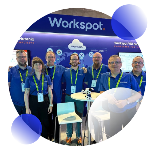 A circular blue shape with multiple members of the Workspot team at an event